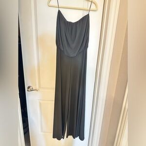 Black, strapless, dressy jumper. Never been worn. Medium.